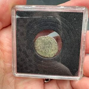 Ancient Roman Coin in Display Case